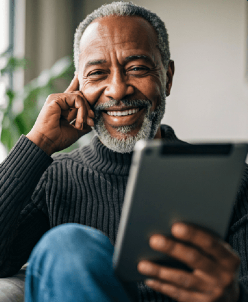 Senior man on tablet